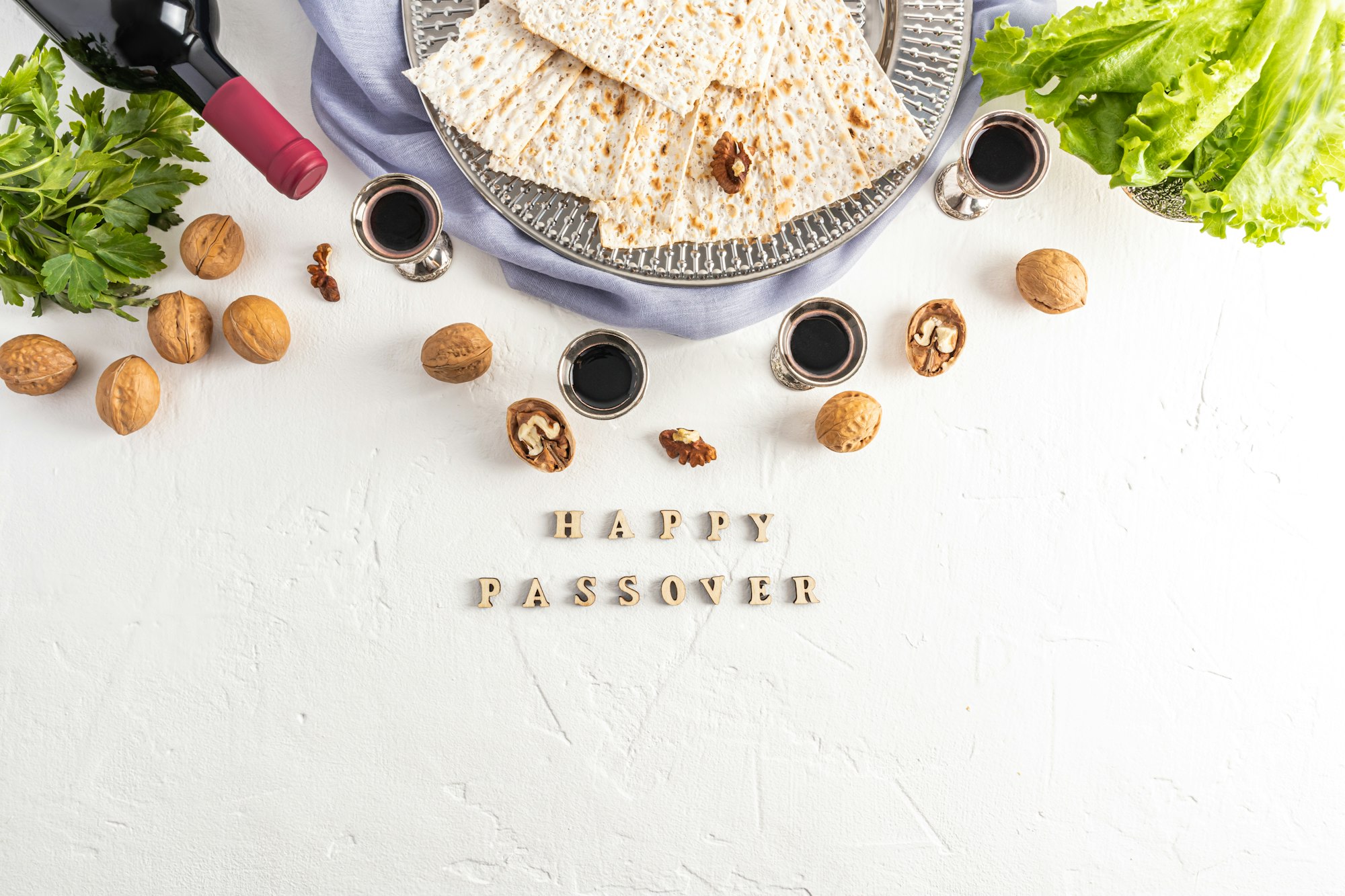 beautiful Passover backdrop of Jewish Passover with products and a word letters - Happy Passover.